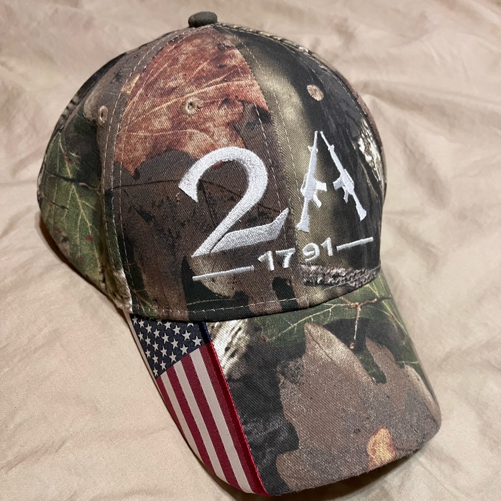 2A brand new Cammo Cap.